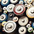 Used Alkaline batteries toxic waste recycling and ecology issues concept background