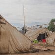 Refugee camp made of tents, people living in very poor conditions, lack of clean water, access to health very limited. Africa