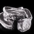 Rhodium nugget, chemical element with Rh symbol, metal for industrial use, used in jewelry and automatic equipment.