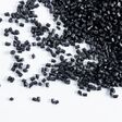 Polypropylene granule close-up background texture. plastic resin ( Masterbatch).Grey chemical granules for industrial plastic production