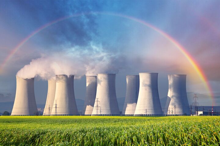 Nuclear power plant with summer field.