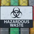 Hazardous waste sign on chain link fence. Oil barrels in background. 3D rendered illustration.