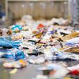 view of waste paper on a conveyor belt