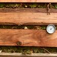 Thermometer showing high temperature in the compost pile