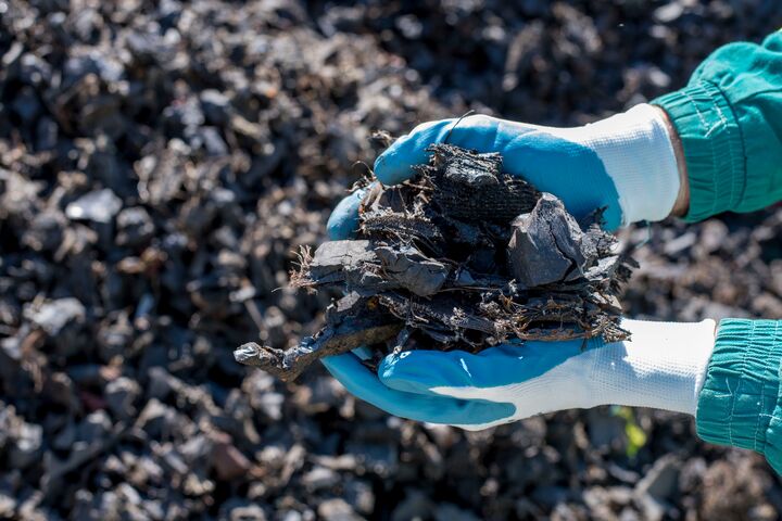 rubber, tires, automotive, waste, recycling, industry, treatment, reuse, man, close up, renewable, sustainability, pyrolysis, alternative, energy, fuel, ecology, shredded, pollution, pile