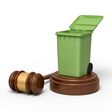 3d rendering of green trash bin on round wooden block and brown wooden gavel. Digital art. Rubbish can. Ecology and environment.