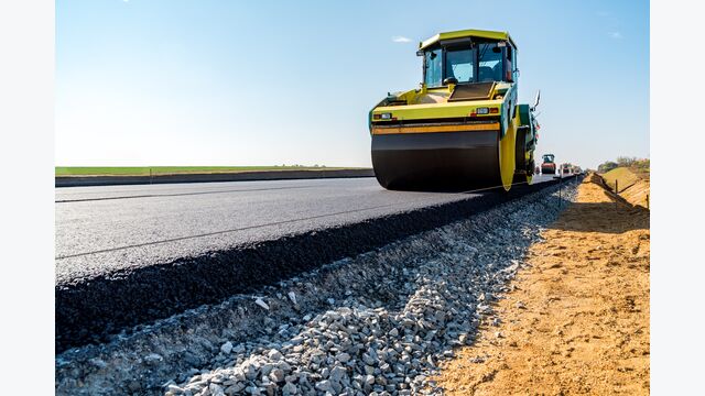 Road rollers building the new asphalt road
