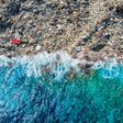 Concept environmental pollution ocean and water with plastic and human waste. Aerial top view.