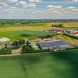 Drone image of a modern biogas plant in Germany during daytime in summer