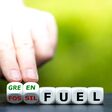 Hand turns dice and changes the expression "fossil fuel" to "green fuel".