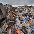 Work of a bulldozer at a landfill