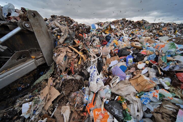 Work of a bulldozer at a landfill