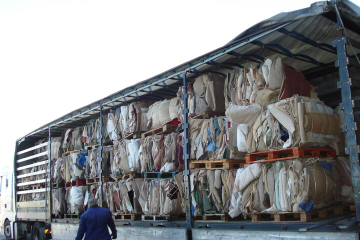 Bales of carpet waste