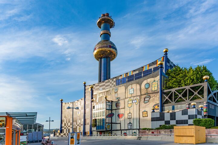 Vienna, Austria - July 22, 2009: The most famous District heating in Vienna of artist Hundertwasser in intensive afternoon light in Vienna, Austria.