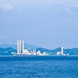 Power plant at day along coast