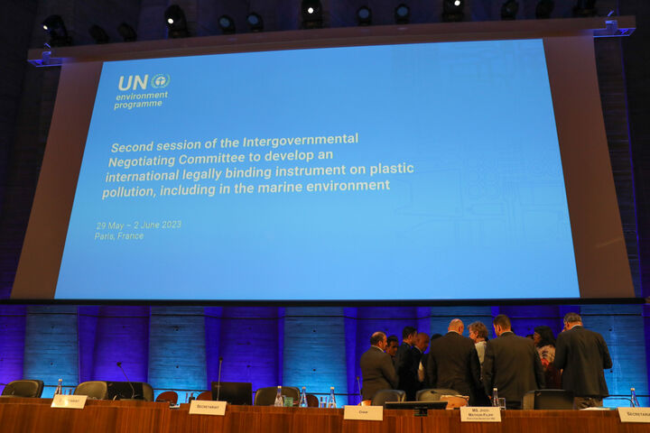 INC Second Seccion, Paris: Delegates huddle on the podium as discussions on the rules of procedure continue