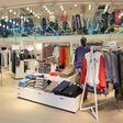 COPENHAGEN, DENMARK - CIRCA SEPTEMBER, 2014: inside H & M store at Copenhagen Airport, Kastrup. H & M Hennes & Mauritz AB is a Swedish multinational retail-clothing company, known for its fast-fashion clothing.