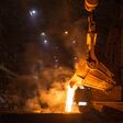 tank, ladle, glow, steel, iron, metal, ferroalloy, alloy, manganese, liquid, ferrous, metallic manganese, ferromanganese, slag, cast, casting, pour, pouring, release, flow, fire, burning, orange, light, heat, hot, smoke, foundry, furnace, molten, melting, smelting, melting-pot, crane, ingot, mold, refractory, plant, factory, mill, metallurgy, metallurgical, heavy, industry, industrial, manufacturing, equipment, production, workshop, steelworks