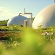 Closeup of a biogas digester, breaking down organic waste and producing ane gas for energy.
