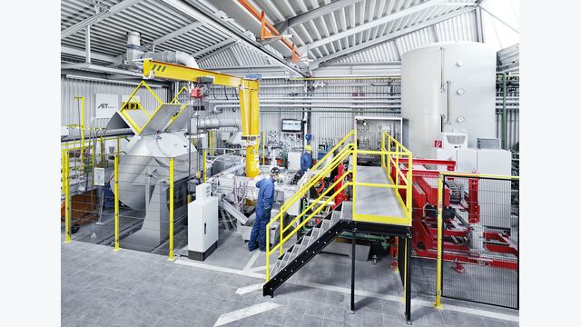The semi-industrial direct chill casting machine for horizontal continuous casting of aluminium alloys with real time control unit at the AIT.