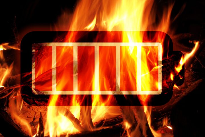 Battery fire, illustration of Li-Ion battery in front of burning fireplace