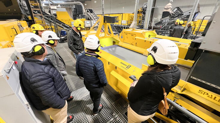Technical discussions and live demonstrations during a guided tour of the STEINERT Test & Development Center.