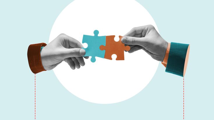 Hands combine puzzle pieces. Art collage.