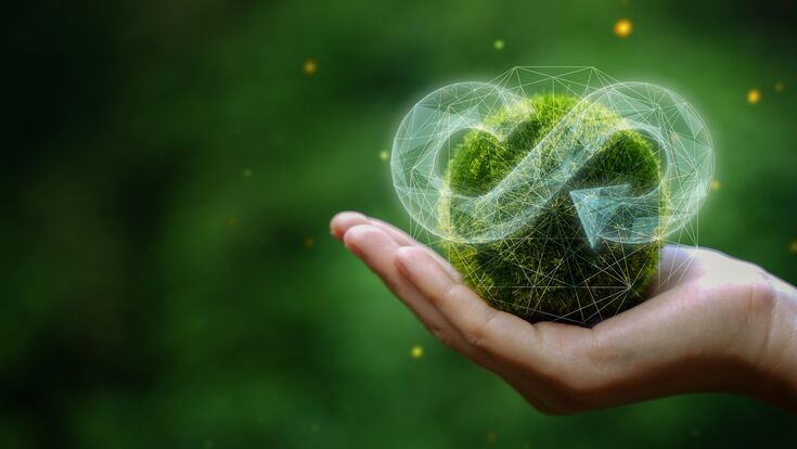 businessman holding circular economy icon Circular economy concept for future business growth and environmental sustainability and reduce pollution for future business and environmental growth.